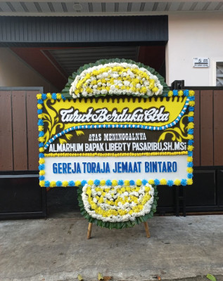 Papan Bunga Duka di Melagi
